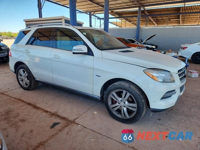 Czwarte zdjęcie samochodu z boku: 2012 MERCEDES-BENZ ML 350 BLUETEC VIN:4JGDA2EB1CA080973 - miniatura
