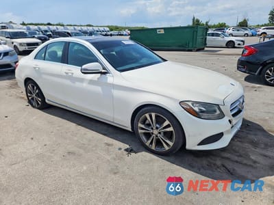 Czwarte zdjęcie samochodu z boku: 2017 MERCEDES-BENZ C 300 VIN:WDDWF4JB9HR252777 - miniatura