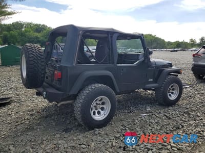 Trzecie zdjęcie samochodu z tyłu: 1998 JEEP WRANGLER / TJ SE VIN:1J4FY29P6WP767716 - miniatura