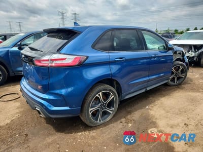 Trzecie zdjęcie samochodu z tyłu: 2019 FORD EDGE ST VIN:2FMPK4AP1KBC22068 - miniatura