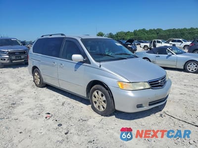 Czwarte zdjęcie samochodu z boku: 2003 HONDA ODYSSEY EXL VIN:5FNRL187X3B062422 - miniatura