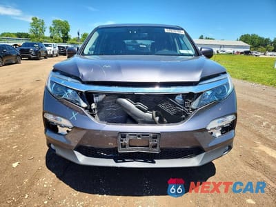 Piąte zdjęcie samochodu w środku: 2018 HONDA PILOT EXL VIN:5FNYF6H54JB008299 - miniatura