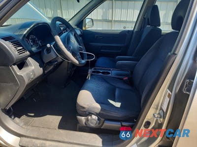 Zdjęcie 7 z 13 samochodu: 2005 HONDA CR-V LX VIN:SHSRD68525U308562 - miniatura