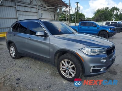 Czwarte zdjęcie samochodu z boku: 2014 BMW X5 XDRIVE35I VIN:5UXKR0C52E0C27155 - miniatura