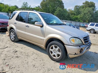 Czwarte zdjęcie samochodu z boku: 2002 MERCEDES-BENZ ML 500 VIN:4JGAB75E42A359081 - miniatura