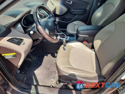 Zdjęcie 7 z 13 samochodu: 2014 HYUNDAI TUCSON SE VIN:KM8JU3AG6EU845193 - miniatura