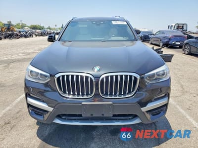 Piąte zdjęcie samochodu w środku: 2021 BMW X3 XDRIVE30E VIN:5UXTS1C05M9G31824 - miniatura