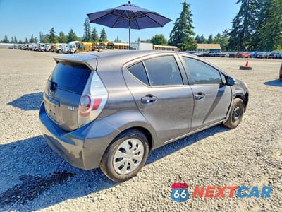 Trzecie zdjęcie samochodu z tyłu: 2014 TOYOTA PRIUS C TWO VIN:JTDKDTB38E1073334 - miniatura