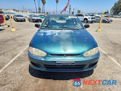 Piąte zdjęcie samochodu w środku: 1997 MITSUBISHI MIRAGE LS VIN:JA3AY31C2VU000216 - miniatura