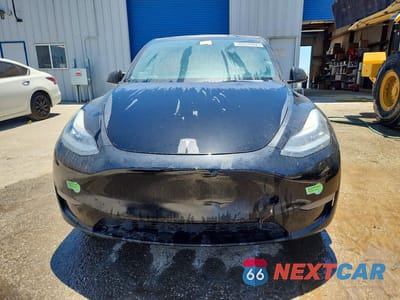 Piąte zdjęcie samochodu w środku: 2021 TESLA MODEL Y VIN:5YJYGDED9MF162993 - miniatura