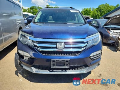 Piąte zdjęcie samochodu w środku: 2017 HONDA PILOT TOURING VIN:5FNYF6H91HB066397 - miniatura
