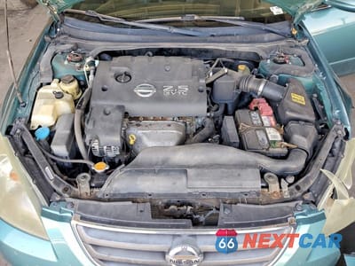 Zdjęcie 11 z 12 samochodu: 2003 NISSAN ALTIMA 2.5 S VIN:1N4AL11E43C228944 - miniatura