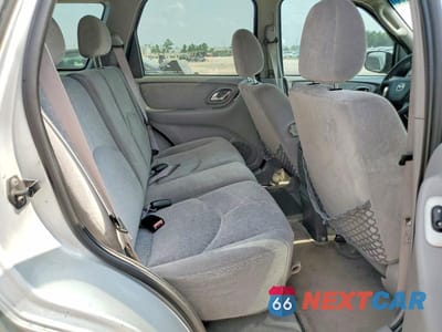 Zdjęcie 11 z 13 samochodu: 2002 MAZDA TRIBUTE LX VIN:4F2YU09112KM34583 - miniatura