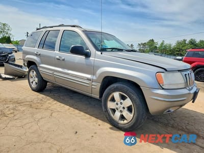 Czwarte zdjęcie samochodu z boku: 2001 JEEP GRAND CHEROKEE LIMITED VIN:1J4GW58N41C515474 - miniatura