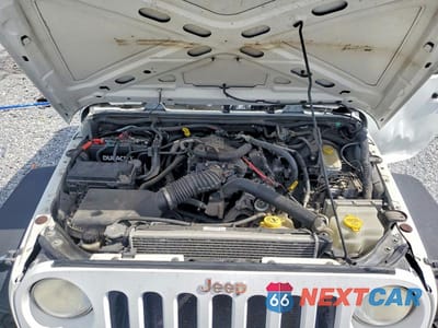 Zdjęcie 11 z 12 samochodu: 2011 JEEP WRANGLER SPORT VIN:1J4AA2D10BL568065 - miniatura