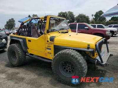 Czwarte zdjęcie samochodu z boku: 2000 JEEP WRANGLER / TJ SPORT VIN:1J4FA49S0YP738560 - miniatura