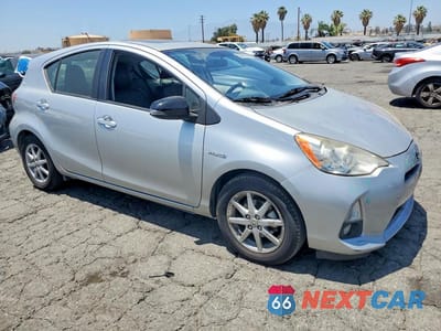 Czwarte zdjęcie samochodu z boku: 2012 TOYOTA PRIUS C FOUR VIN:JTDKDTB3XC1014749 - miniatura