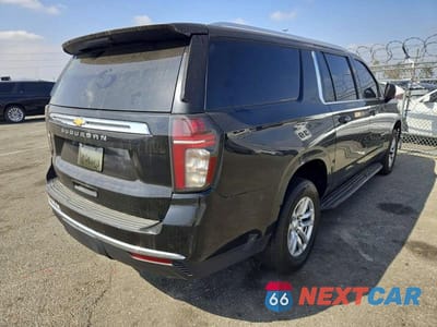 Trzecie zdjęcie samochodu z tyłu: 2021 CHEVROLET SUBURBAN C1500 LT VIN:1GNSCCKD9MR319441 - miniatura