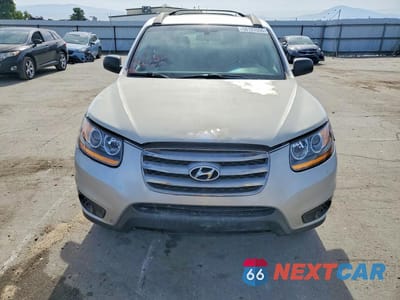 Piąte zdjęcie samochodu w środku: 2012 HYUNDAI SANTA FE GLS VIN:5XYZG3AB4CG102033 - miniatura