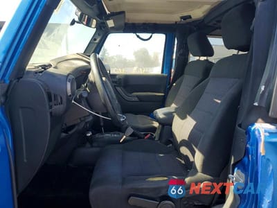 Zdjęcie 7 z 13 samochodu: 2015 JEEP WRANGLER SPORT VIN:1C4AJWAG8FL510474 - miniatura