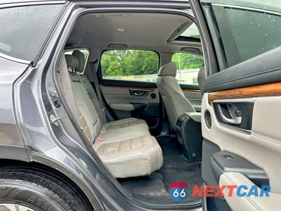 Piąte zdjęcie samochodu w środku: 2018 HONDA CR-V EXL VIN:2HKRW2H88JH656043 - miniatura