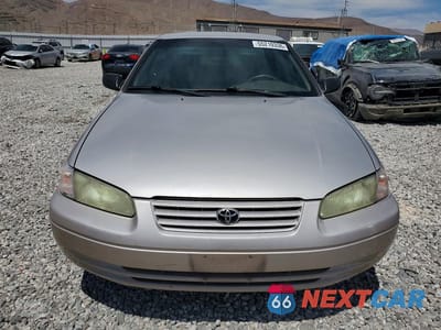 Piąte zdjęcie samochodu w środku: 1999 TOYOTA CAMRY LE VIN:4T1BG22KXXU418370 - miniatura
