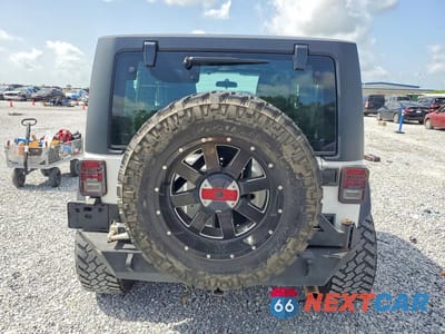 Zdjęcie 6 z 12 samochodu: 2011 JEEP WRANGLER SPORT VIN:1J4AA2D10BL568065 - miniatura