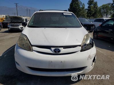 Piąte zdjęcie samochodu w środku: 2010 TOYOTA SIENNA LE 7-PASSENGER VIN:5TDKK4CCXAS308632 - miniatura