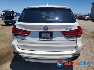 Zdjęcie 6 z 12 samochodu: 2014 BMW X5 SDRIVE35I VIN:5UXKR2C55E0C00396 - miniatura