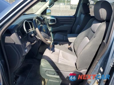 Zdjęcie 7 z 12 samochodu: 2006 HONDA RIDGELINE RTS VIN:2HJYK16496H520744 - miniatura