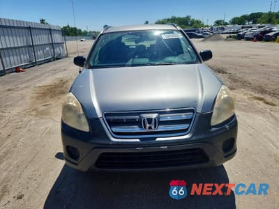Piąte zdjęcie samochodu w środku: 2005 HONDA CR-V LX VIN:SHSRD68525U308562 - miniatura