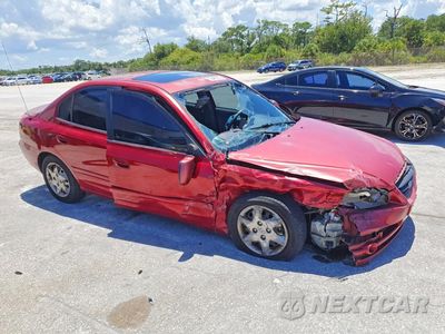 Czwarte zdjęcie samochodu z boku: 2004 HYUNDAI ELANTRA GLS/GT VIN:KMHDN46DX4U909507 - miniatura