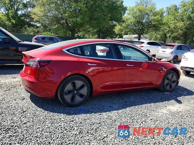 Trzecie zdjęcie samochodu z tyłu: 2018 TESLA MODEL 3 VIN:5YJ3E1EA0JF040717 - miniatura