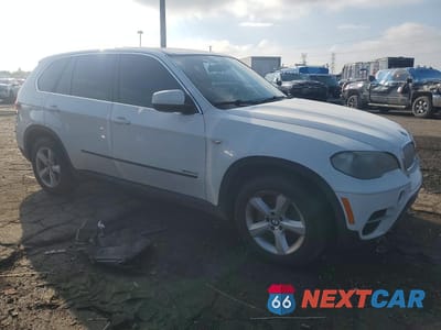 Czwarte zdjęcie samochodu z boku: 2011 BMW X5 XDRIVE50I VIN:5UXZV8C50BL419304 - miniatura