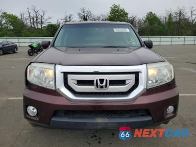 Piąte zdjęcie samochodu w środku: 2011 HONDA PILOT EXL VIN:5FNYF4H64BB015493 - miniatura