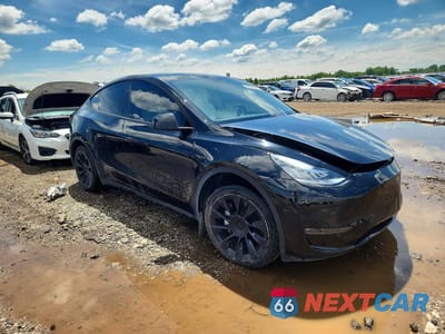 Czwarte zdjęcie samochodu z boku: 2023 TESLA MODEL Y VIN:7SAYGDEE5PA141734 - miniatura