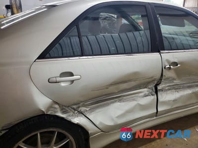 Zdjęcie 10 z 12 samochodu: 2003 TOYOTA CAMRY LE VIN:JTDBE32K330227956 - miniatura
