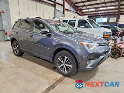 Czwarte zdjęcie samochodu z boku: 2016 TOYOTA RAV4 XLE VIN:JTMRFREV1GD190344 - miniatura