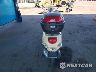 Czwarte zdjęcie samochodu z boku: 2013 VESPA LX 150IE VIN:ZAPM688F6D5201416 - miniatura