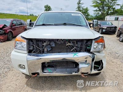 Piąte zdjęcie samochodu w środku: 2012 NISSAN TITAN SV VIN:1N6AA0EC7CN303706 - miniatura