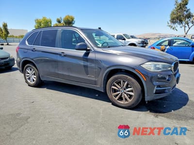Czwarte zdjęcie samochodu z boku: 2014 BMW X5 SDRIVE35I VIN:5UXKR2C51E0H31319 - miniatura