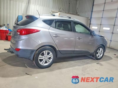 Trzecie zdjęcie samochodu z tyłu: 2012 HYUNDAI TUCSON GLS VIN:KM8JUCAC4CU544447 - miniatura