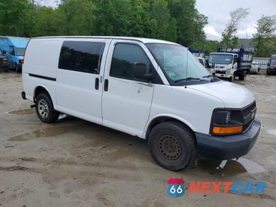 Czwarte zdjęcie samochodu z boku: 2014 CHEVROLET EXPRESS G1500 VIN:1GCSHAF44E1140068 - miniatura