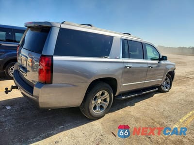 Trzecie zdjęcie samochodu z tyłu: 2018 CHEVROLET SUBURBAN K1500 LT VIN:1GNSKHKC2JR296149 - miniatura