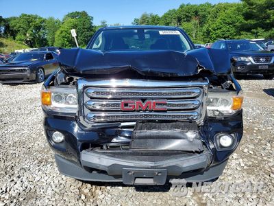 Piąte zdjęcie samochodu w środku: 2015 GMC CANYON VIN:1GTH6BEAXF1184204 - miniatura