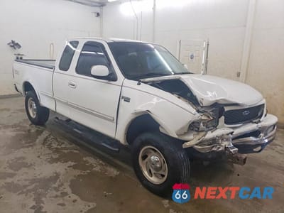 Czwarte zdjęcie samochodu z boku: 1997 FORD F150 VIN:1FTDX18W4VNC99272 - miniatura