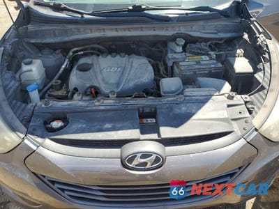 Zdjęcie 12 z 13 samochodu: 2014 HYUNDAI TUCSON SE VIN:KM8JUCAG2EU826642 - miniatura