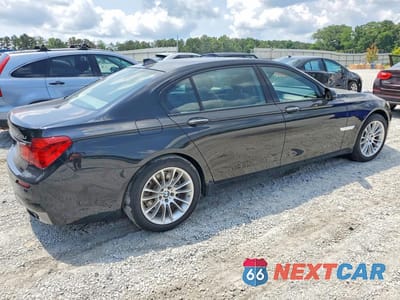 Trzecie zdjęcie samochodu z tyłu: 2014 BMW 750 LXI VIN:WBAYF8C56ED652965 - miniatura