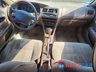 Zdjęcie 8 z 12 samochodu: 1997 TOYOTA COROLLA BASE VIN:1NXBA02E8VZ621027 - miniatura