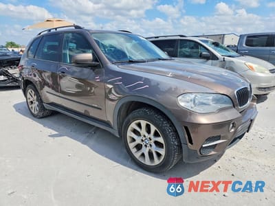 Czwarte zdjęcie samochodu z boku: 2012 BMW X5 XDRIVE35I VIN:5UXZV4C51CL988527 - miniatura